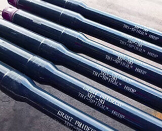 Heavy weight drill pipe stacked on a rack